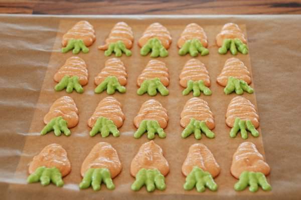 Piping carrot macarons