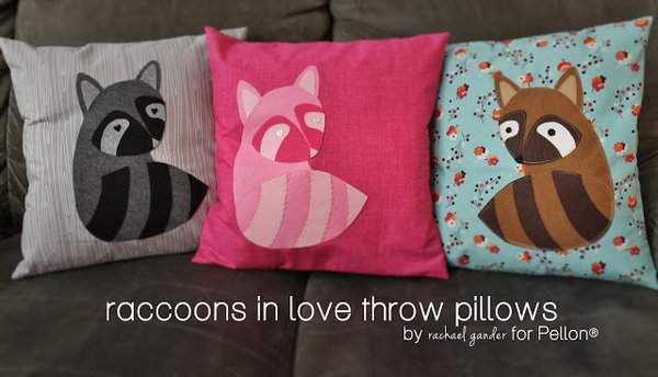 Raccoons in love throw pillows on Imagine Gnats