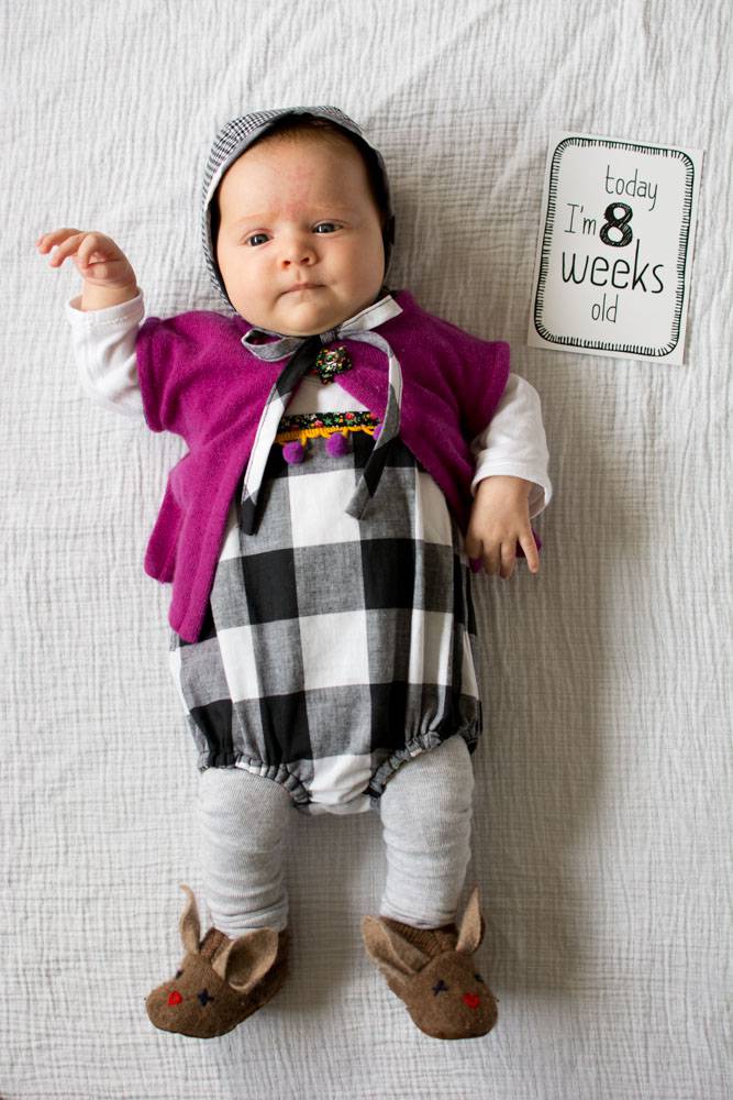 Celina from Petit a Petit's romper, hat and cardigan