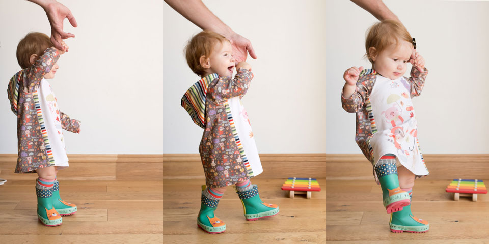 Rainy days rainbow dress. A mashup of the Safari Raglan dress with the Rowan Tee hood, patterns by Titchy Threads.