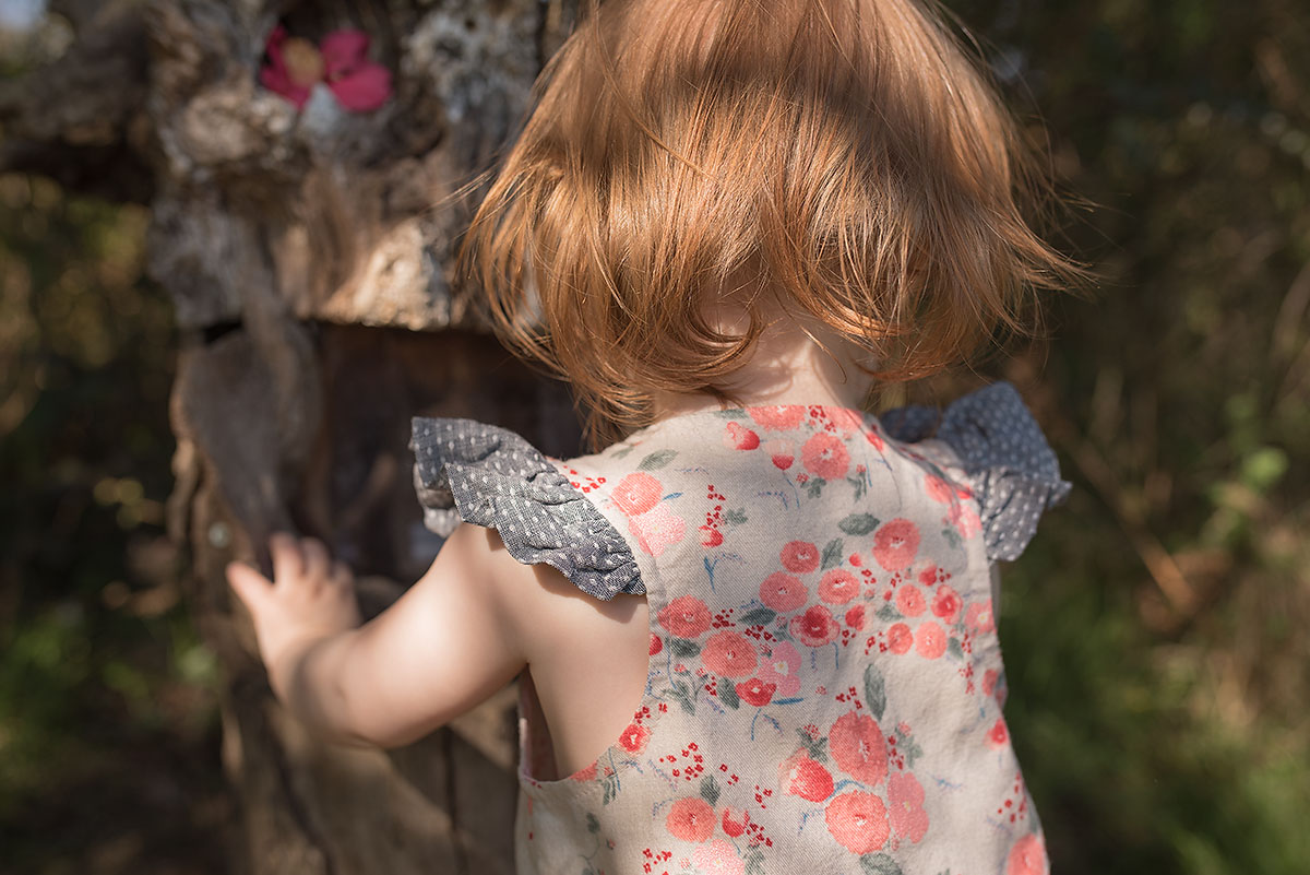 Floral Rain Dance Romper with contrast flutter sleeves