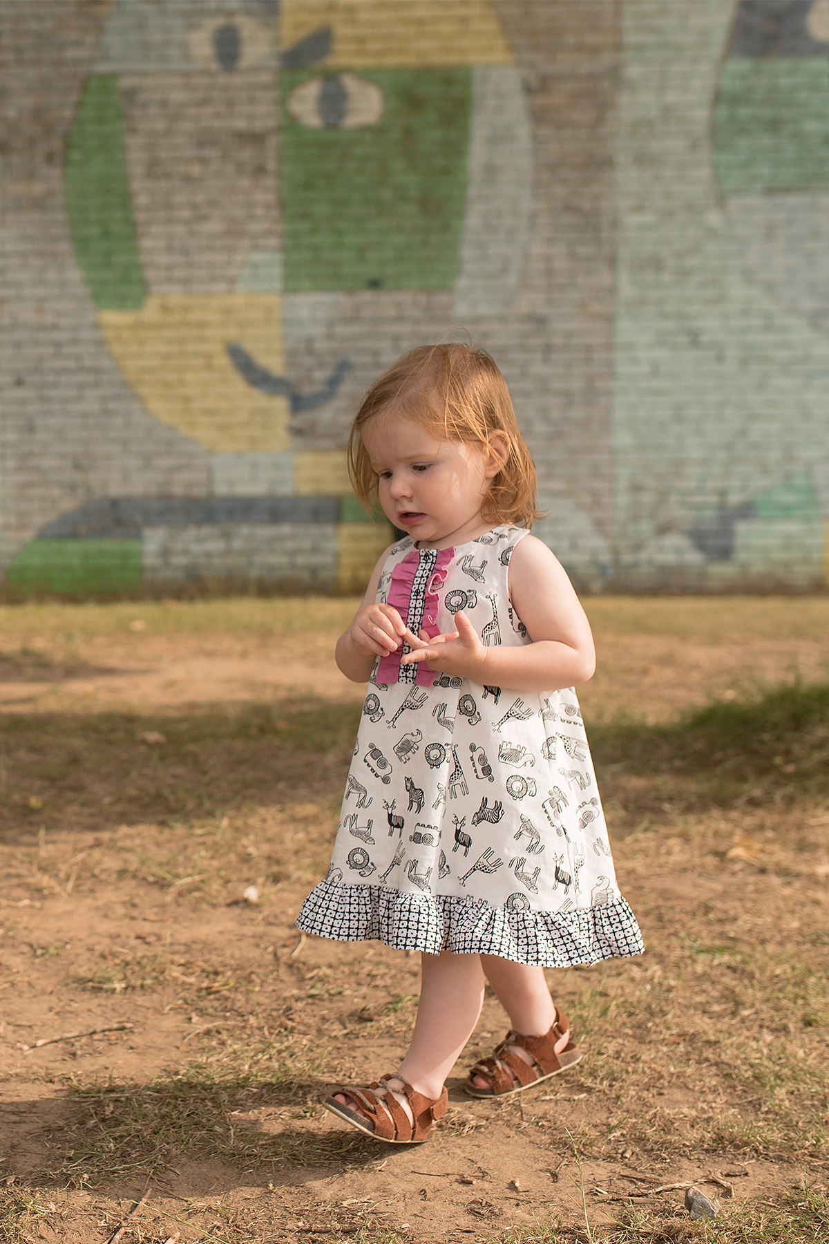 Wee wanders Rushbrook dress with ruffle placket and ruffle hem